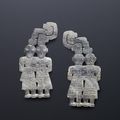 A very rare pair of grey jade 'twins' pendants, Warring States Period or later