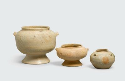 A group of three small glazed containers with green enamel splashes, Hán Việt period, 1st-4th centuries