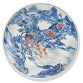 A blue and white and copper-red 'Master of the Rocks' saucer dish, Early Kangxi period (1662-1722)