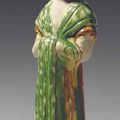 A sancai-glazed pottery figure of a court lady, Tang dynasty (618-907)