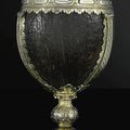 A coconut cup with continental silver-gilt mounts, marked with a crowned rampant lion to left, circa 1550