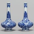 Two blue and white 'lotus' bottle vases, Qing dynasty, Kangxi period (1662-1722)       