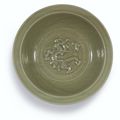 A large Longquan celadon-glazed 'dragon' dish, Yuan dynasty (1279-1366