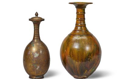 A sancai-glazed bottle vase and a bronze long neck bottle vase with cover, Sui dynasty (581-618)