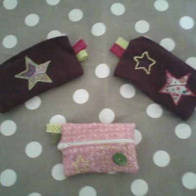 un trio de porte monnaie