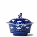 A very rare Imperial reverse-decorated blue and white bowl and cover, Yongzheng six-character marks and of the period