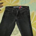 Item 4 - jeans noire délavées - taille 23 jambe étroite - Guess - légèrement usé