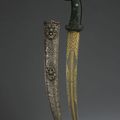 A jade-hilted dagger with gold-inlaid inscribed blade and diamond-set silver scabbard. Ottoman Turkey, circa 18th century