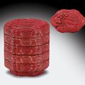 Two rare carved red lacquer four-tiered boxes and covers, 16th century at Christie's NY 26 March 2010