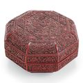 A carved red and black lacquer octagonal box and cover, Jiajing six-character incised and gilt mark and of the period (1522-1566