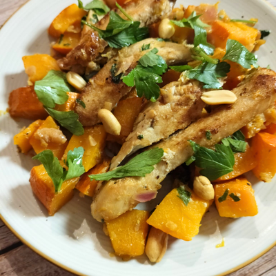 Sauté de poulet au potimarron, éclats de cacahuètes et agrumes