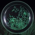 A very rare black-ground green enamelled dish, China, underglaze-blue Yongzheng six-character mark and period