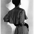 Suzy Parker modeling a Balenciaga dress at the Paris collections, Vogue 1952