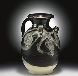 A fine phosphatic-splashed brown-glazed stoneware ever. 10th century