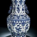 An octogonal blue and white vase with fruit and flower branches, underglaze blue Qianlong seal mark, 19th century