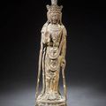 A large carved wood figure of Guanyin. Ming Dynasty