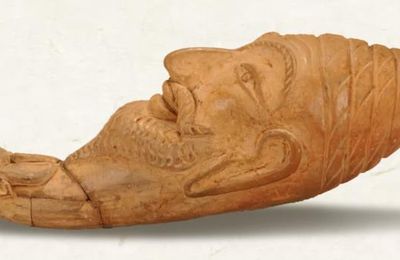 Pottery water container decorated with a human head and an ox head, Tang dynasty (618-907)