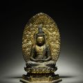 A lacquer and gilt wood sculpture of Kannon Bosatsu (Bodhisattva) seated in kekka fuza, Japan, 16th-17th century, Momoyama-Edo p