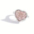 Platinum, 18 karat rose gold, pink diamond and diamond ring