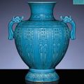 A rare carved and moulded Turquoise-Glazed Archaistic Baluster Vase. Qianlong incised six-character sealmark and of the period 