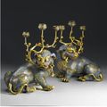 A good pair of cloisonné Fu-lion candelabras. Qing dynasty, 18th century.