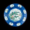 A famille verte powder-blue-ground 'landscape' dish. Kangxi