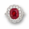 A  cushion-shaped ruby and diamond ring