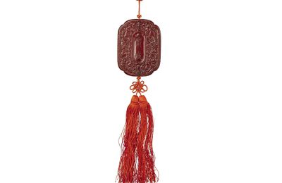 A rare imperial amber ritual zhaijie pendant ,Qing dynasty, 18th-19th century