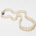 A Fine Graduated Single Strand Natural Pearl Necklace