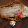 Collier ficelle orange, perles roses et coeur d'argent