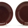 Pair of Chinese red glazed porcelain plates, Qianlong mark and of the period