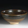 A large Cizhou type black glazed stoneware bowl with 'oil spot' decoration. Jin Dynasty