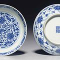 A pair of blue and white 'lotus' dishes, Qianlong seal marks in underglaze blue and of the period (1736-1795)
