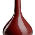 A monochrome red-brown glazed porcelain bottle vase, China, Wanli mark, Qing dynasty