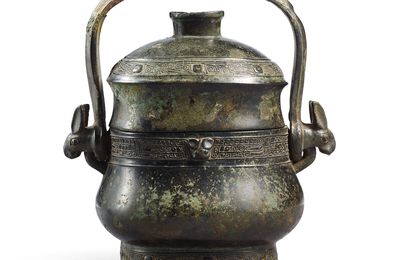 A rare archaic bronze 'Tapir' ritual wine vessel and cover, you, Early Western Zhou Dynasty