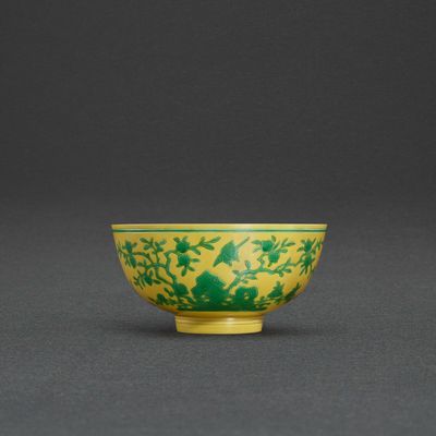 An incised yellow-ground green-enamelled 'longevity' bowl, Mark and period of Yongzheng