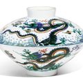 A doucai 'dragon' bowl and cover, Yongzheng mark and period (1723-1735)