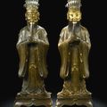 A pair of gilt-bronze Daoist Immortals, Qing dynasty, 18th century