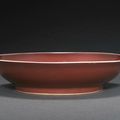 A copper red glazed deep dish, Qianlong six-character mark and of the period