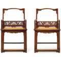 A very rare pair of huanghuali low-back armchairs, fushouyi, 17th century