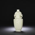 An exceptional very pale green jade vase and cover, Qianlong period (1736-1795)