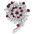 A diamond and ruby flower brooch, by Oscar Heyman & Brothers