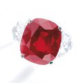 WORLD RECORD PRICE FOR A RUBY. Superb and extremely rare 25.59 carats Mogok 'pigeon blood red' ruby and diamond ring