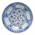 A large blue and white Kubachi pottery dish, probably Tabriz, North Iran, Early 17th century