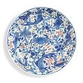 A large underglaze blue and copper-red 'Fish' dish, Qing dynasty, Kangxi period (1662-1722)
