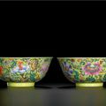 A fine pair of famille-rose yellow-ground 'floral' bowls, seal marks and period of Daoguang (1821-1850)