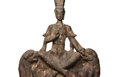 A carved limestone seated figure of Maitreya, Northern Wei Dynasty or later