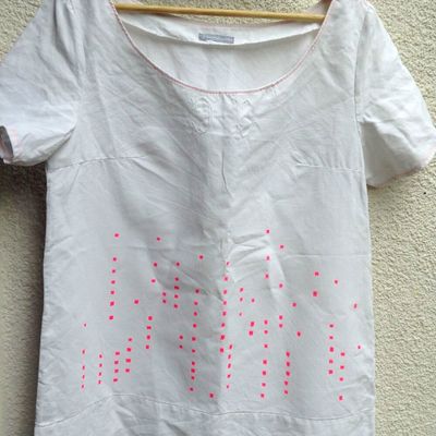 Des hauts pour l'été en drap blanc