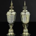 An unusual pair of small German parcel-gilt silver cups and covers of historical interest, Hans Weber, Nuremberg, circa 1626