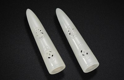A pair of white jade nail guards, 18th century